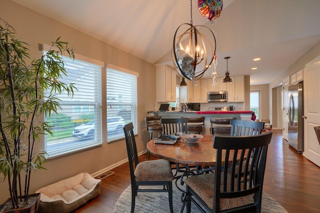1013 Bluff Crest Dr, Columbus, OH 43235 - dining space with a chandelier, plenty of natural light, dark wood-style floors, recessed lighting, and vaulted ceiling
