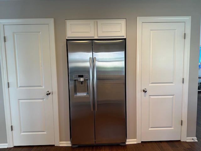 1013 Bluff Crest Dr, Columbus, OH 43235 - kitchen featuring built in fridge, white cabinets, and dark wood-style floors