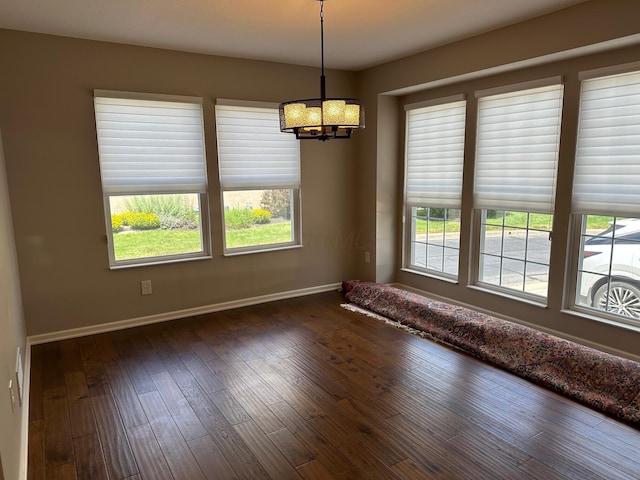 1013 Bluff Crest Dr, Columbus, OH 43235 - spare room featuring a chandelier and dark wood finished floors