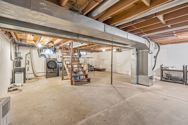 7472 Davis Rd, Hilliard, OH 43026 - unfinished below grade area featuring stairs and heating unit