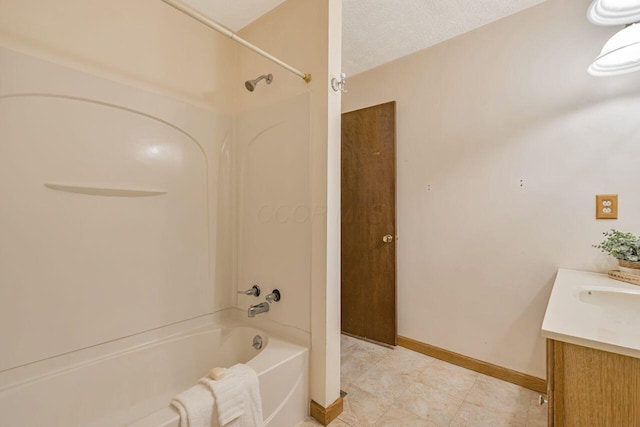 7472 Davis Rd, Hilliard, OH 43026 - full bath with shower / tub combination, vanity, and a textured ceiling