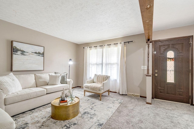 7472 Davis Rd, Hilliard, OH 43026 - living room featuring carpet flooring and a textured ceiling