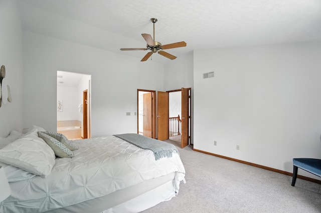 526 Springwood Lake Dr, Columbus, OH 43230 - bedroom with light colored carpet, vaulted ceiling, ceiling fan, and ensuite bathroom