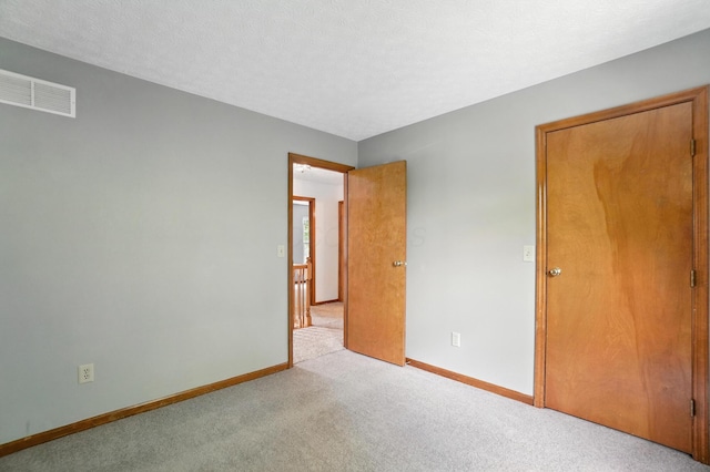 526 Springwood Lake Dr, Columbus, OH 43230 - unfurnished bedroom with light carpet and baseboards