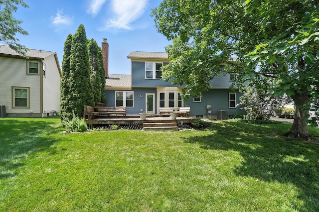 526 Springwood Lake Dr, Columbus, OH 43230 - rear view of house featuring a yard, a wooden deck, and a chimney