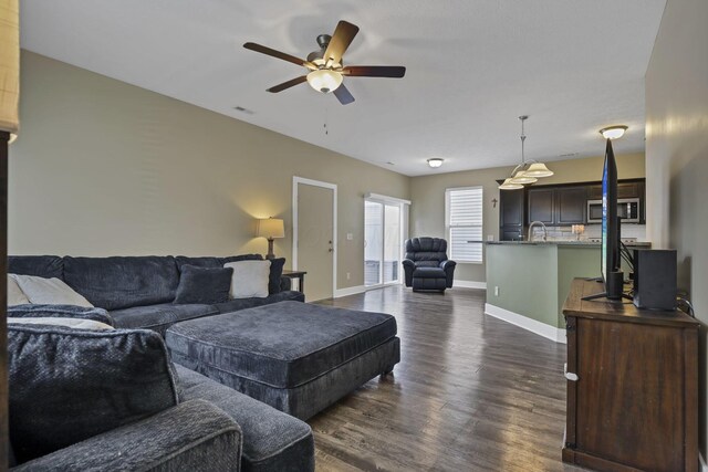 68 Asbury Ave, Newark, OH 43055 - living area featuring dark wood-type flooring and a ceiling fan