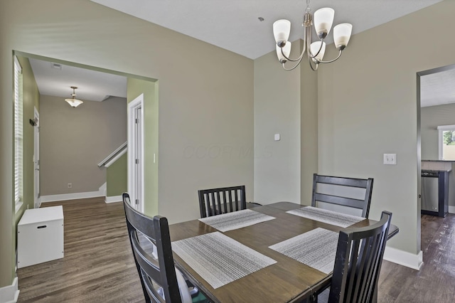 68 Asbury Ave, Newark, OH 43055 - dining space with wood finished floors and a chandelier