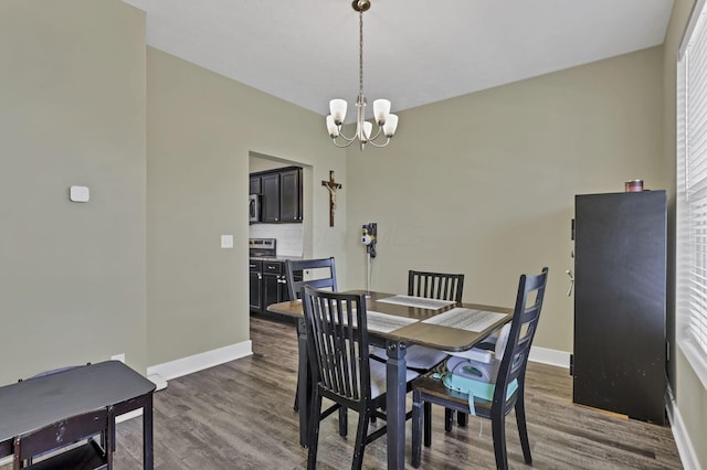 68 Asbury Ave, Newark, OH 43055 - dining area with dark wood-style floors and a chandelier