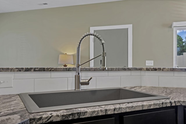 68 Asbury Ave, Newark, OH 43055 - kitchen view of a sink and white cabinets