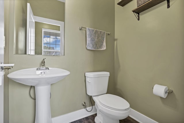 68 Asbury Ave, Newark, OH 43055 - bathroom with baseboards and wood finished floors