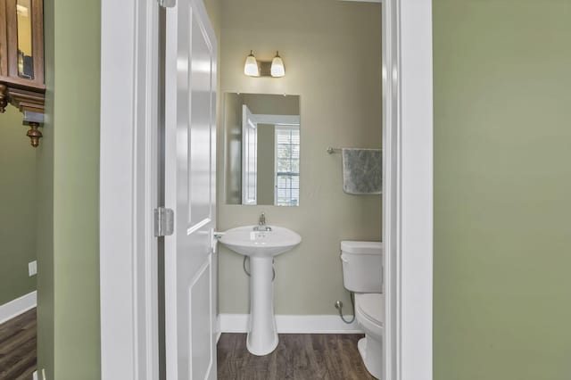 68 Asbury Ave, Newark, OH 43055 - half bath with toilet and wood finished floors
