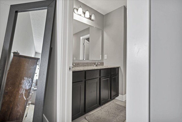 68 Asbury Ave, Newark, OH 43055 - bathroom featuring vanity and baseboards