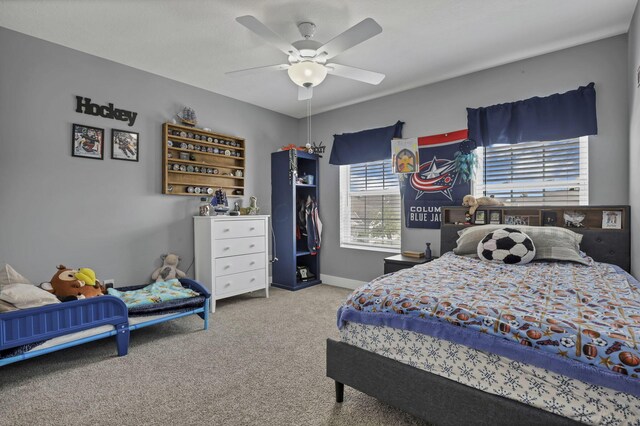 68 Asbury Ave, Newark, OH 43055 - carpeted bedroom with a ceiling fan and baseboards