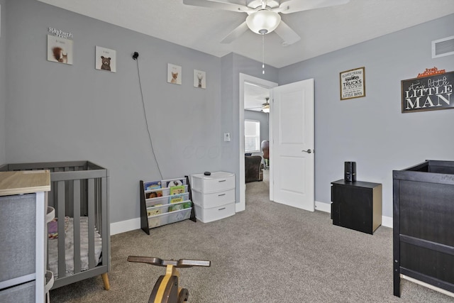 68 Asbury Ave, Newark, OH 43055 - bedroom with a crib, carpet, and ceiling fan