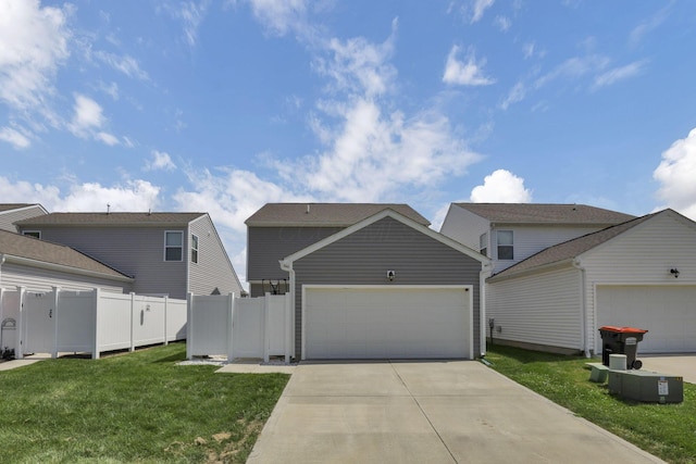68 Asbury Ave, Newark, OH 43055 - traditional-style house with a garage and driveway