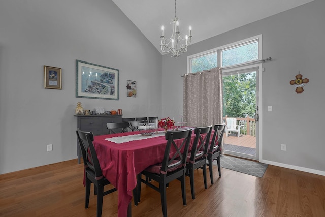 1691 Cloverdale Dr, Lancaster, OH 43130 - dining room featuring high vaulted ceiling, a chandelier, and wood finished floors
