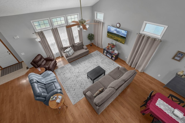 1691 Cloverdale Dr, Lancaster, OH 43130 - living area with high vaulted ceiling, ceiling fan, and wood finished floors