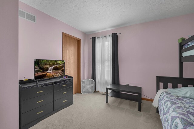 1691 Cloverdale Dr, Lancaster, OH 43130 - bedroom with light carpet and a textured ceiling