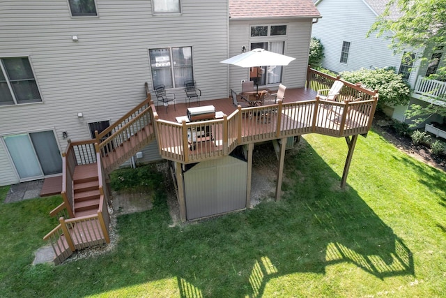 1691 Cloverdale Dr, Lancaster, OH 43130 - back of house with stairs, a wooden deck, a yard, and outdoor dining space