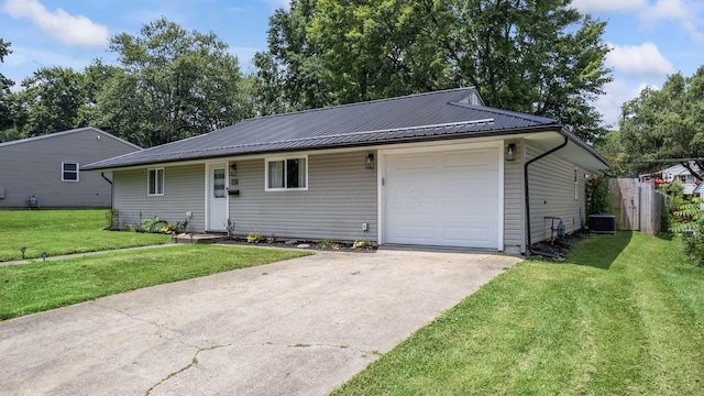 1815 Union St, Lancaster, OH 43130 - ranch-style house featuring concrete driveway, an attached garage, and a metal roof