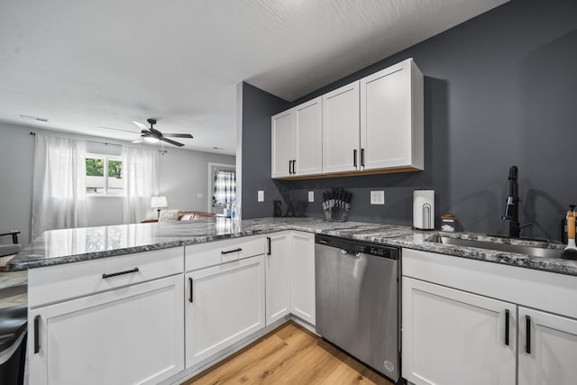 1815 Union St, Lancaster, OH 43130 - kitchen featuring dishwasher, a peninsula, ceiling fan, and white cabinets