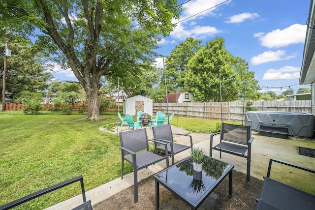 1815 Union St, Lancaster, OH 43130 - fenced backyard with a storage unit, a patio, and grilling area