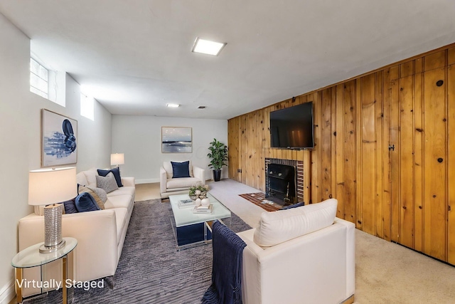 1054 Highland Dr, Columbus, OH 43220 - carpeted living area with wooden walls and a fireplace
