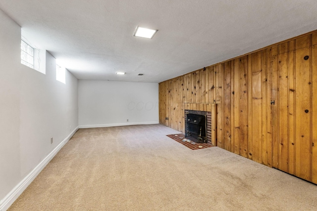 1054 Highland Dr, Columbus, OH 43220 - unfurnished living room featuring carpet floors, wooden walls, and a textured ceiling