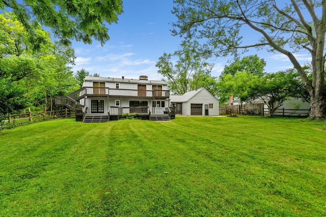 1054 Highland Dr, Columbus, OH 43220 - rear view of house with a deck and a fenced backyard
