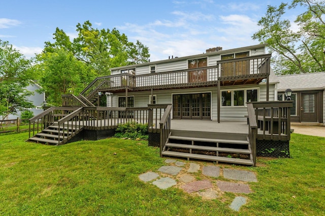1054 Highland Dr, Columbus, OH 43220 - back of house with stairway, a lawn, and a deck