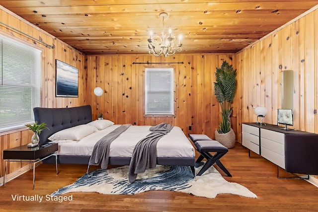 1054 Highland Dr, Columbus, OH 43220 - bedroom featuring a chandelier, wooden ceiling, wood walls, and wood finished floors