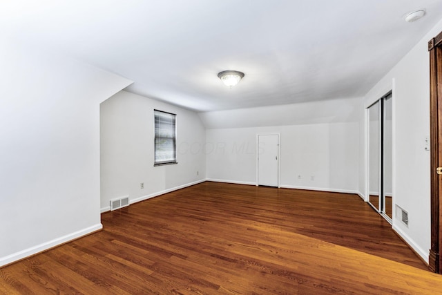 1054 Highland Dr, Columbus, OH 43220 - additional living space with wood finished floors and lofted ceiling
