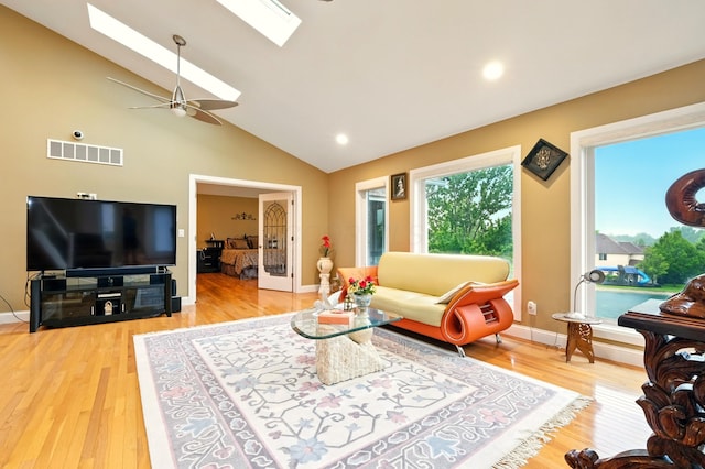 1515 Oak Run Ct, Mansfield, OH 44906 - living area with a skylight, light wood-style flooring, a ceiling fan, high vaulted ceiling, and recessed lighting