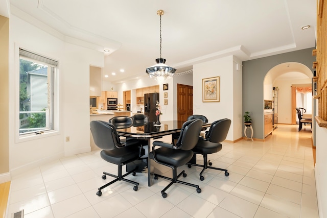 1515 Oak Run Ct, Mansfield, OH 44906 - dining space featuring arched walkways, a chandelier, recessed lighting, and light tile patterned flooring