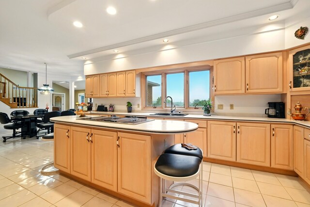1515 Oak Run Ct, Mansfield, OH 44906 - kitchen with light brown cabinetry, a center island, light tile patterned floors, light countertops, and recessed lighting
