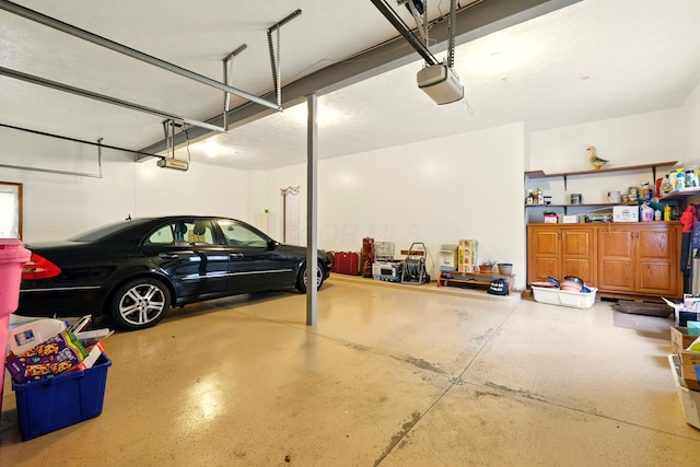 1515 Oak Run Ct, Mansfield, OH 44906 - garage featuring a garage door opener