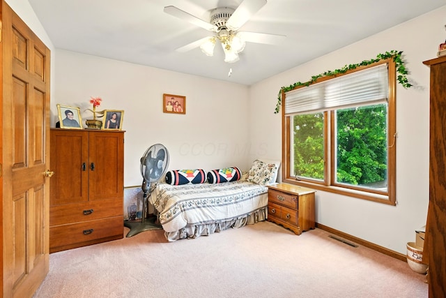 1515 Oak Run Ct, Mansfield, OH 44906 - bedroom featuring light carpet and ceiling fan