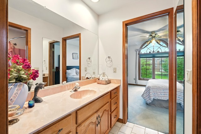 1515 Oak Run Ct, Mansfield, OH 44906 - bathroom featuring ensuite bathroom, vanity, tile patterned floors, and a ceiling fan