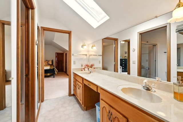 1515 Oak Run Ct, Mansfield, OH 44906 - ensuite bathroom with a skylight, vaulted ceiling, double vanity, an enclosed shower, and tile patterned floors