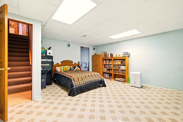1515 Oak Run Ct, Mansfield, OH 44906 - bedroom featuring a drop ceiling and concrete block wall