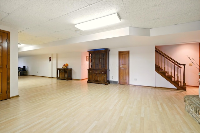 1515 Oak Run Ct, Mansfield, OH 44906 - unfurnished living room featuring stairway and wood finished floors