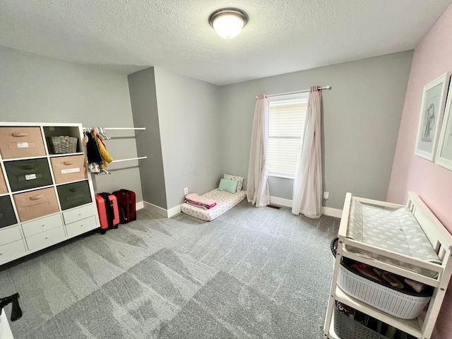 6871 Manor Crest Ln, Canal Winchester, OH 43110 - carpeted bedroom with a textured ceiling and baseboards
