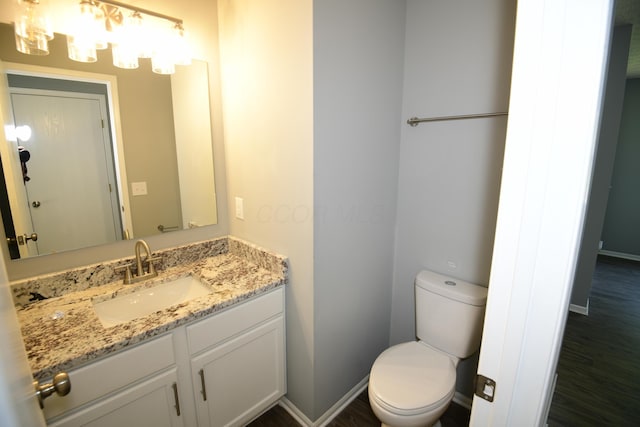 3565 Motts Place Ct, Canal Winchester, OH 43110 - half bath with vanity and wood finished floors