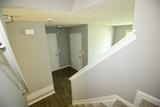 3565 Motts Place Ct, Canal Winchester, OH 43110 - stairway with wood finished floors and a textured ceiling