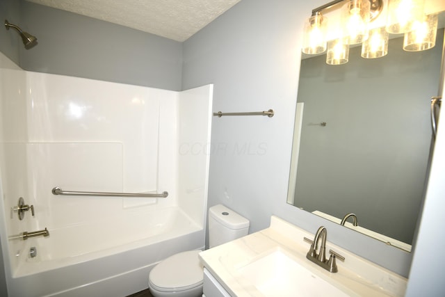 3565 Motts Place Ct, Canal Winchester, OH 43110 - bathroom featuring vanity, bathing tub / shower combination, and a textured ceiling