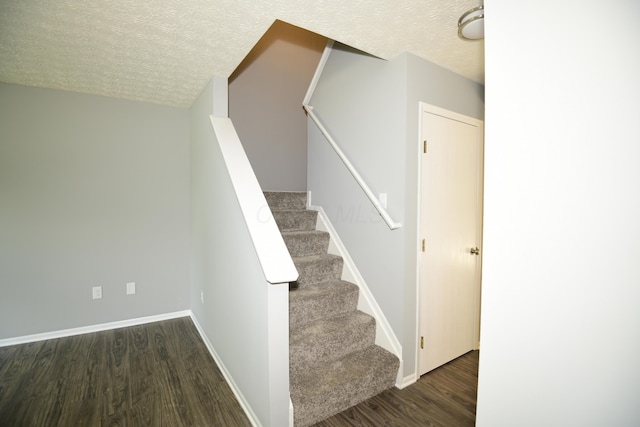 3565 Motts Place Ct, Canal Winchester, OH 43110 - stairs with wood finished floors and a textured ceiling