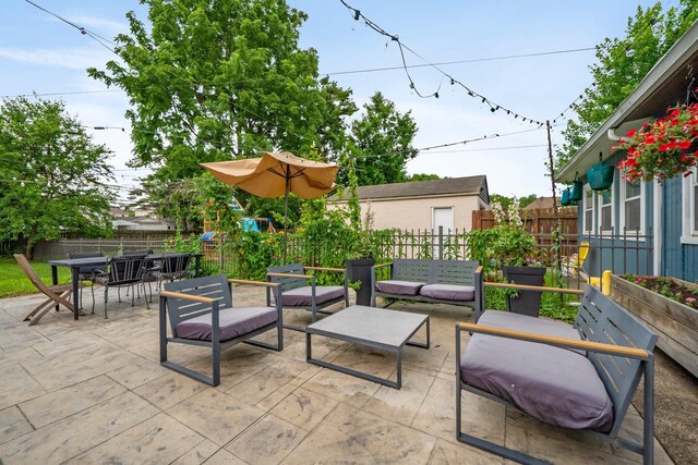 1484 Glenn Ave, Columbus, OH 43212 - fenced backyard with a patio, outdoor dining space, and an outdoor living space