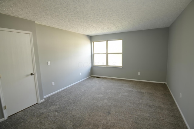 3434 Royal Hill Dr, Columbus, OH 43223 - unfurnished room with a textured ceiling and carpet flooring