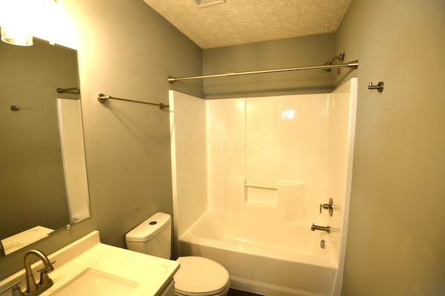 3434 Royal Hill Dr, Columbus, OH 43223 - full bath with washtub / shower combination, a textured ceiling, and vanity