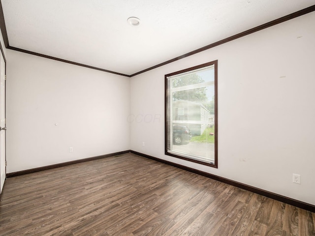 10610 E State Route 762 Unit 74B, Lockbourne, OH 43137 - spare room with wood finished floors and crown molding